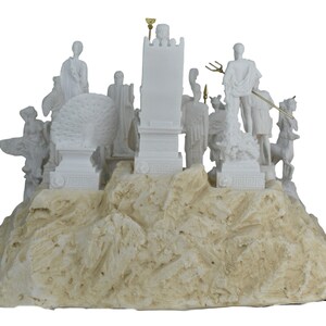May include: White marble sculpture of the Greek gods and goddesses on a rocky base. The sculpture features figures of Zeus, Hera, Poseidon, Athena, Apollo, Artemis, Aphrodite, Ares, Hermes, and Hephaestus.