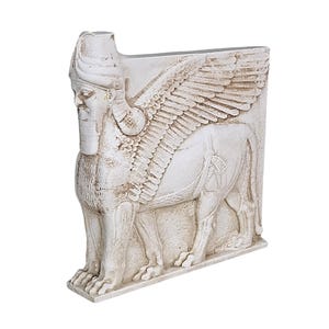 lamassu Winged bull with a human head guardian figure Louvre mesopotamian relief sculpture statue plaster