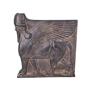 lamassu guardian Winged bull with a human head  figure Louvre mesopotamian relief sculpture statue plaster
