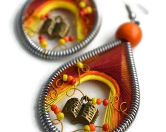 Book lover handmade earrings with book charms and yellow orange and red colours. Perfect gift for library girls and those who loves to read.