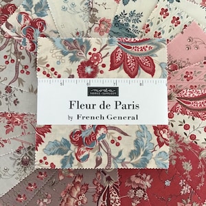 May include: A collection of fabric squares with floral patterns in red, blue, and cream. The fabric squares are arranged in a fan shape. The text "Fleur de Paris" by French General is visible.