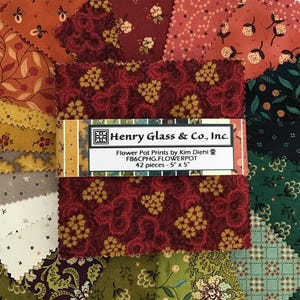 May include: A stack of 42 fabric squares measuring 5 inches by 5 inches, featuring various floral and geometric patterns in shades of red, orange, yellow, green, and cream. A paper band labeled Henry Glass & Co., Inc. Flower Pot Prints is wrapped around the center.