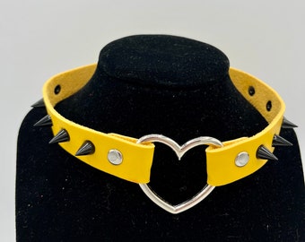 cute yellow heart choker with black spikes