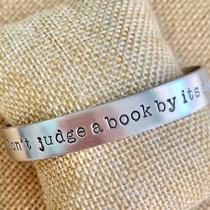 Don&#39;t judge a book by its movie cuff-hand stamped jewelry-gifts for her-book jewelry-gifts for teens-gifts under 15-book bracelet