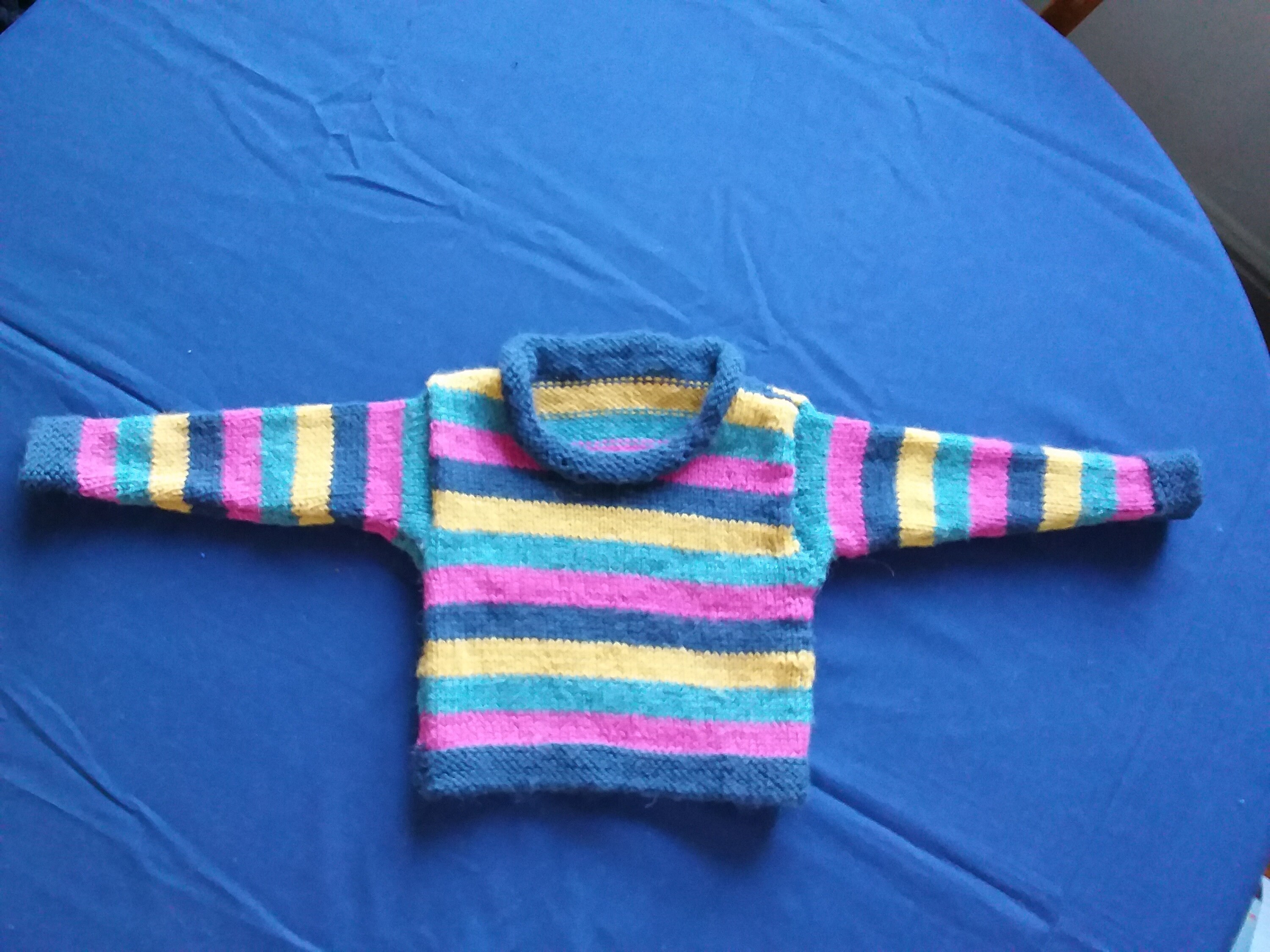 Baby's striped jumper in wool/alpaca. Approx. 6-9 months.
