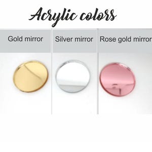 May include: Image of three circular acrylic pieces in gold mirror, silver mirror, and rose gold mirror. The text "Acrylic colors" is written in cursive at the top of the image. Each circle is displayed against a white background.