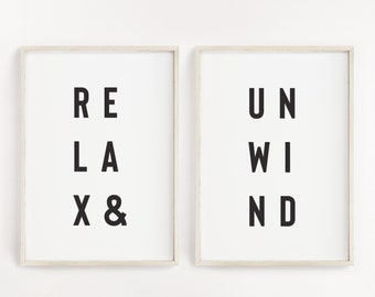 Puede incluir: Dos impresiones enmarcadas con las palabras "Relax & Unwind" en texto negro sobre fondo blanco.