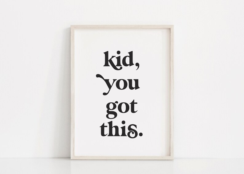 May include: A white framed print with black text that reads "kid, you got this."