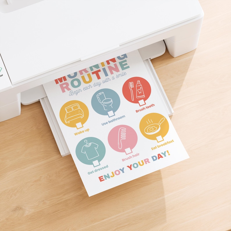 May include: A white printer printing a colorful "Morning Routine" chart. The chart includes illustrated steps like "Wake up," "Brush teeth," and "Eat breakfast." The text "ENJOY YOUR DAY!" is at the bottom.