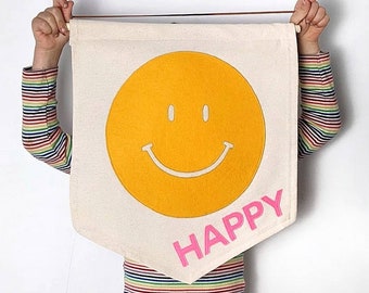 Smiley face happy banner in your choice of 2 colours.