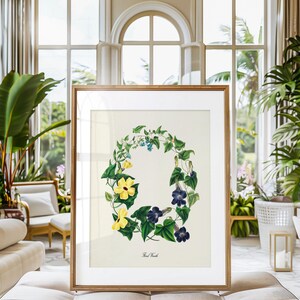 May include: A vintage botanical illustration of a floral wreath with yellow and blue flowers. The wreath is surrounded by green leaves and vines. The text "Tweed Wreath" is printed below the wreath.