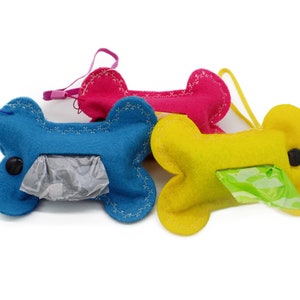 Poop bolsa dispensador soporte hueso en forma de llavero hecho con fieltro colorido