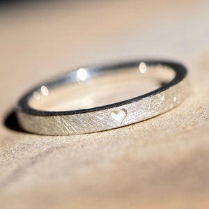 Silver engagement ring with heart