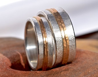 Wedding rings made of silver with rose gold hammered DUO