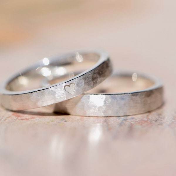 Wedding rings hammered silver with heart