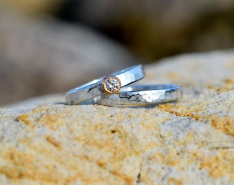 Hammered wedding rings with diamond in rose gold setting