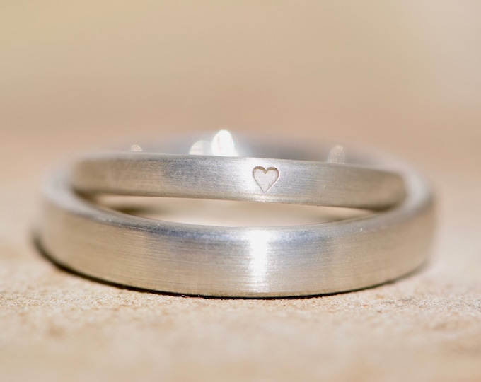 Silver wedding rings with heart as friendship rings for women and men