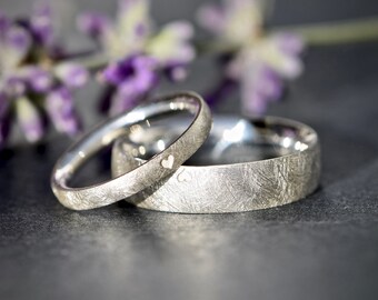 Classic silver wedding rings with heart