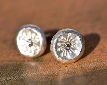 Silver stud earrings with diamonds