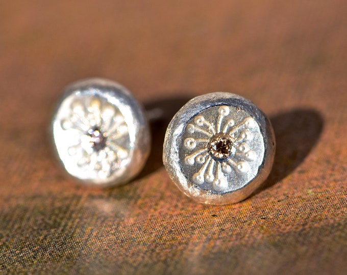 Silver stud earrings with diamond