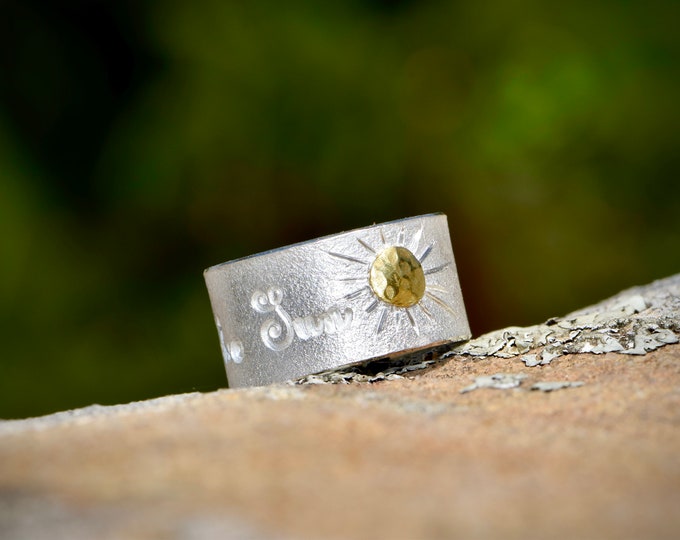 Silver ring with engraving and sun made of gold *FOLLOW THE SUN*