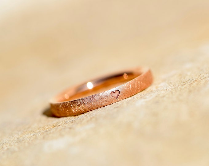 Rose gold engagement ring with heart