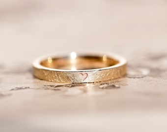 Bague de fiançailles en or rose avec coeur