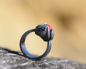 Silver ring blackened with red coral