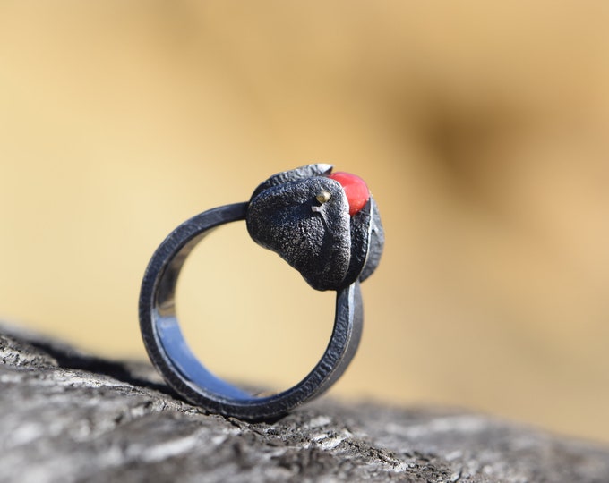 Silver ring blackened with red coral