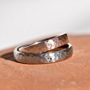 Wedding rings hammered in platinum and rose gold with hearts *Same same but different*
