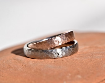 Wedding rings hammered in platinum and red gold with little hearts *Same same but different*