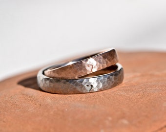 Wedding rings hammered in platinum and red gold with little hearts *Same same but different*