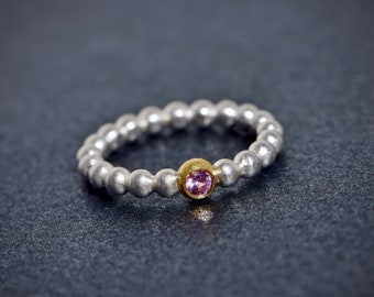 Silver and gold ball ring with pink sapphire