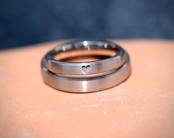 Wedding rings platinum unusual matt with heart engraving handmade as special couple rings