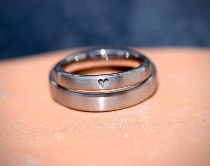 Wedding rings platinum unusual matt with heart engraving handmade as special couple rings