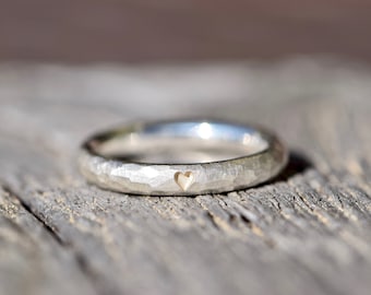 Hammered silver engagement ring with heart