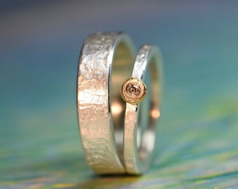 Wedding rings silver hammered with diamond set in rose gold also as engagement rings or partner rings
