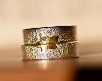 Wedding rings handmade with star made of gold with diamond