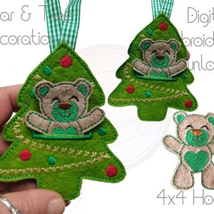 May include: Green felt Christmas tree ornament with a smiling bear applique. The bear is tan with green accents and a green heart. The tree has red and green decorative accents and a green and white ribbon. Text reads "Bear & Tree Decoration" and "Digital Embroidery Download".