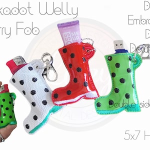 May include: Three different embroidery designs for a polka dot welly boot carry fob. The designs are in red, white, and green with black polka dots. The text "Double sided!" and "5x7 Hoop" are also included in the image.