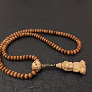 Tibetan Juniper Mala Necklace: 108 Buddhist Prayer Beads with Buddha Pendant