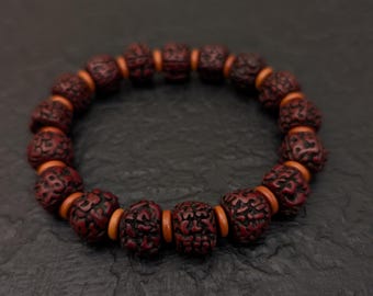 Rudraksha bracelet, natural vintage Nepalese Shiva seed beads and orange olive wood beads