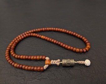 Collana Mala in osso di yak: rosario buddista tibetano con pendente a forma di ruota di preghiera rotante