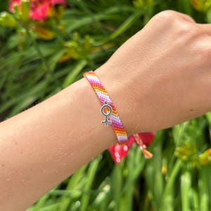 Lesbian Pride Bracelet: 7-Stripe Cotton Wristband with Venus Charm