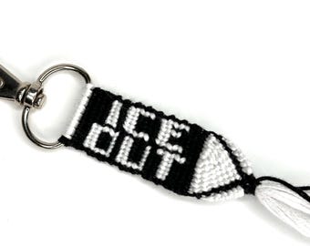 ICE OUT keychain, minimal protest keychain, anti-ICE message, subtle activism accessory
