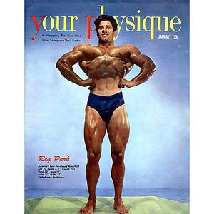 May include: A magazine cover featuring a muscular man in a blue swimsuit, posing with his arms crossed. The magazine is titled "Your Physique" and the cover features the text "A Magazine For Men Who Want To Improve Their Bodies" and "January 25c". The cover also features the text "Reg Park" and "America's Best Developed Man 1950" along with his age, height, and weight.