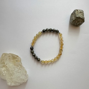 attract abundance / themed crystal healing bracelet / citrine and pyrite gemstones / stackable bracelet