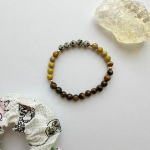 favorite deputy cowboy inspired gemstone stackable bracelet ft tigers eye, dalmatian stone, and jasper / toy story inspired