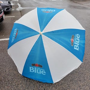 labatt blue patio umbrella Tilt | Auto-Tilt, LED Lighting, Wind Resistant | Commercial Grade | Sunbrella Dark Adopt an extended canopy in triple size with 3 small ventilation openings Safavieh Milan Fringe 9Ft Crank
