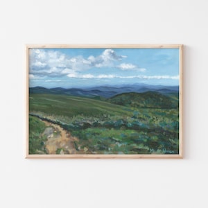 May include: A painting of a mountain landscape with a winding dirt path leading through the green hills. The sky is blue with white clouds.
